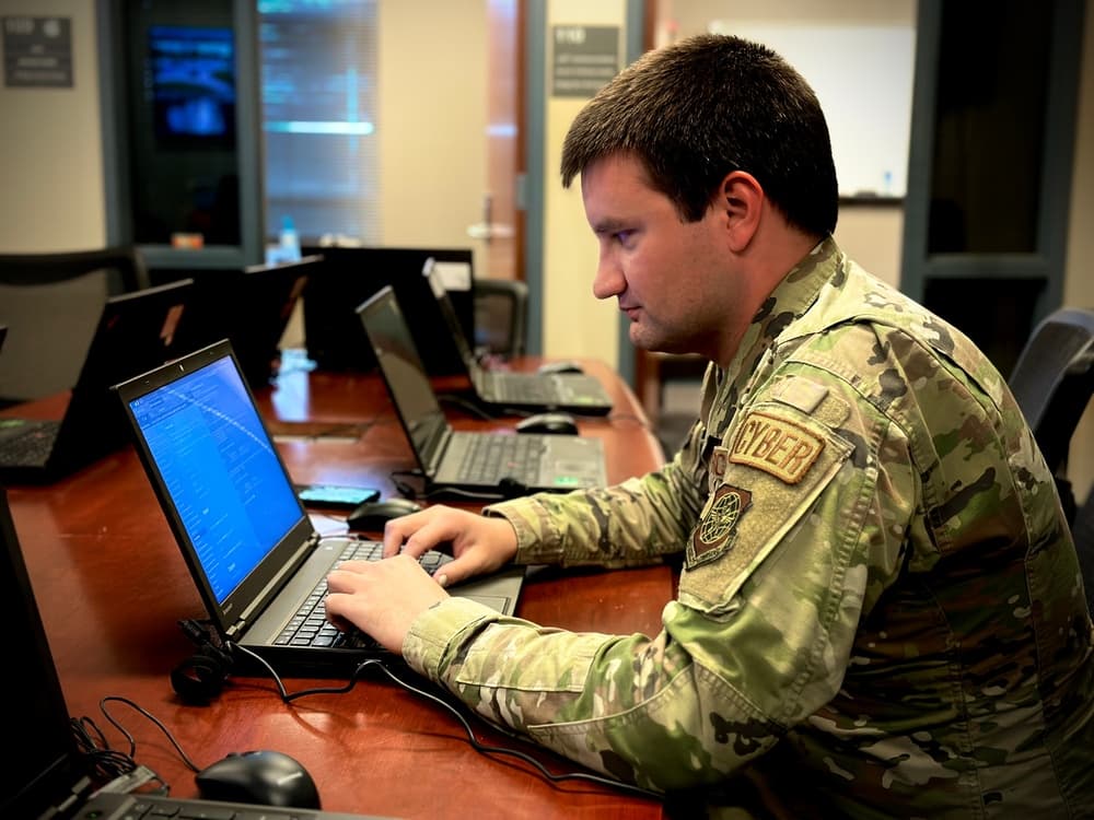 Cyber specialist running scripts during an authorized cyber exercise