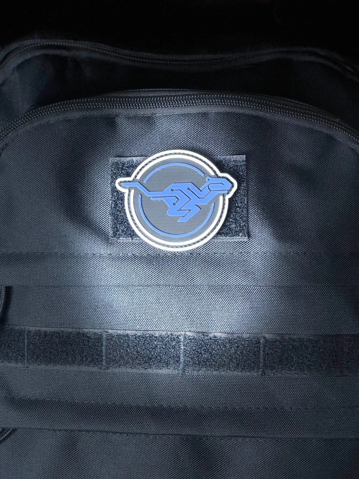 Mascot patch fitted to a bag